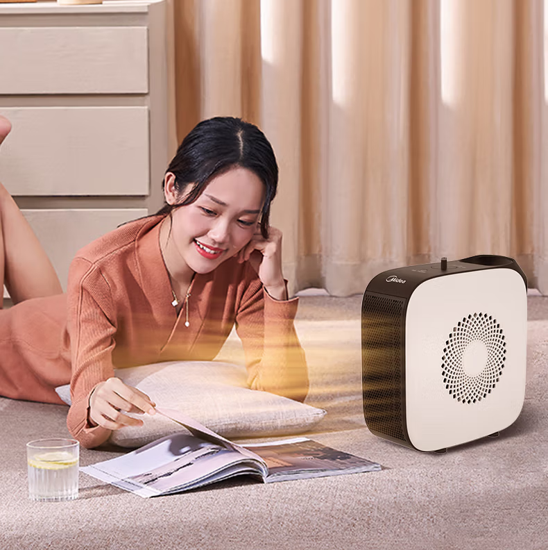 Midea取暖器家用暖风机电暖器桌面气冷暖两用速热便携卧室办公室小型暖手宝 【便携不占地】HF18C
