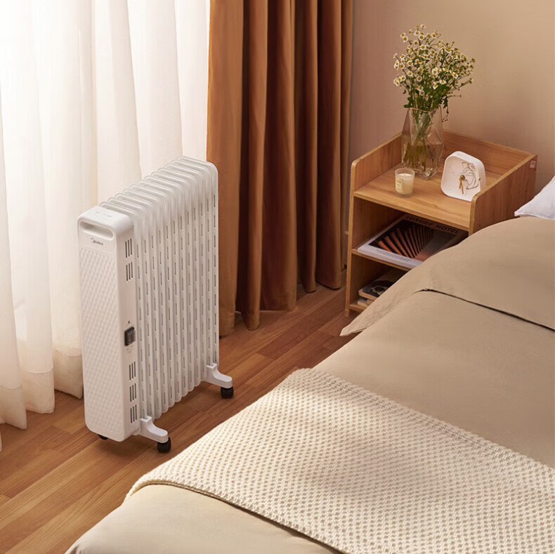 Midea“白玉”取暖器/电暖气片家用/取暖炉/加湿烘衣/13片大面积劲暖/电热油汀取暖器HYX22N
